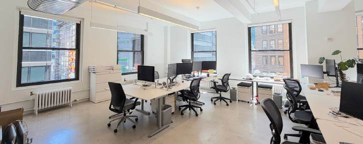 Workstations along large windows